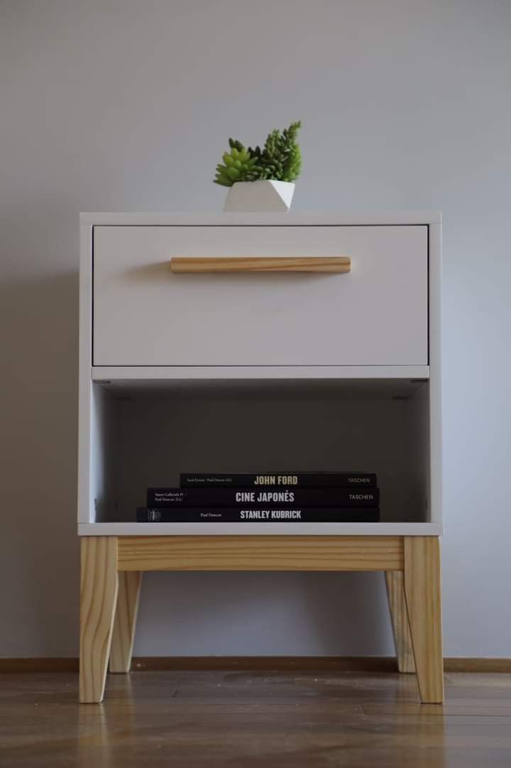 Imperial Homes blue wood side table for bedroom with drawer, wooden legs, and small plant on top