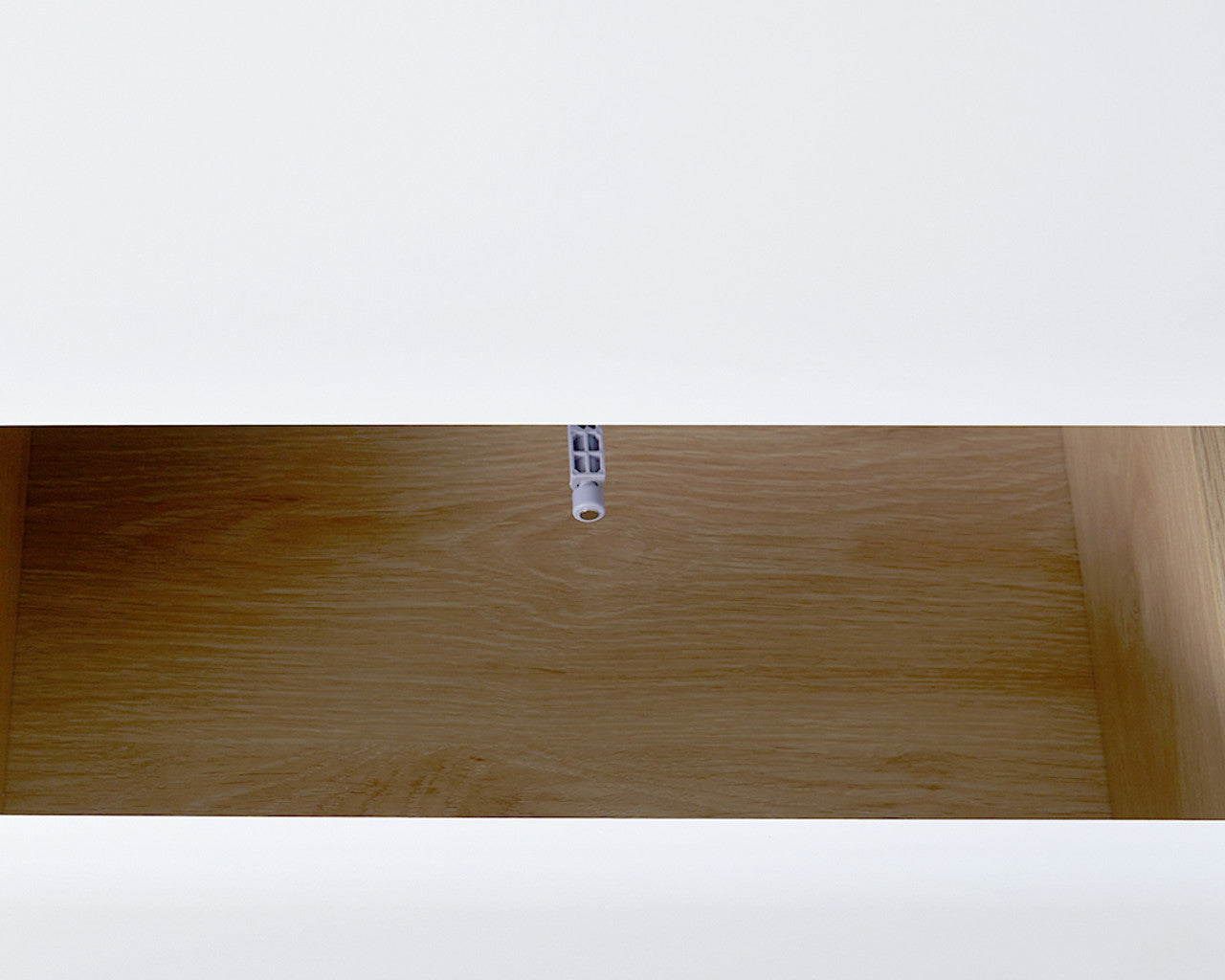 Interior view of empty wooden drawer from coastal buffet sideboard by Imperial Homes