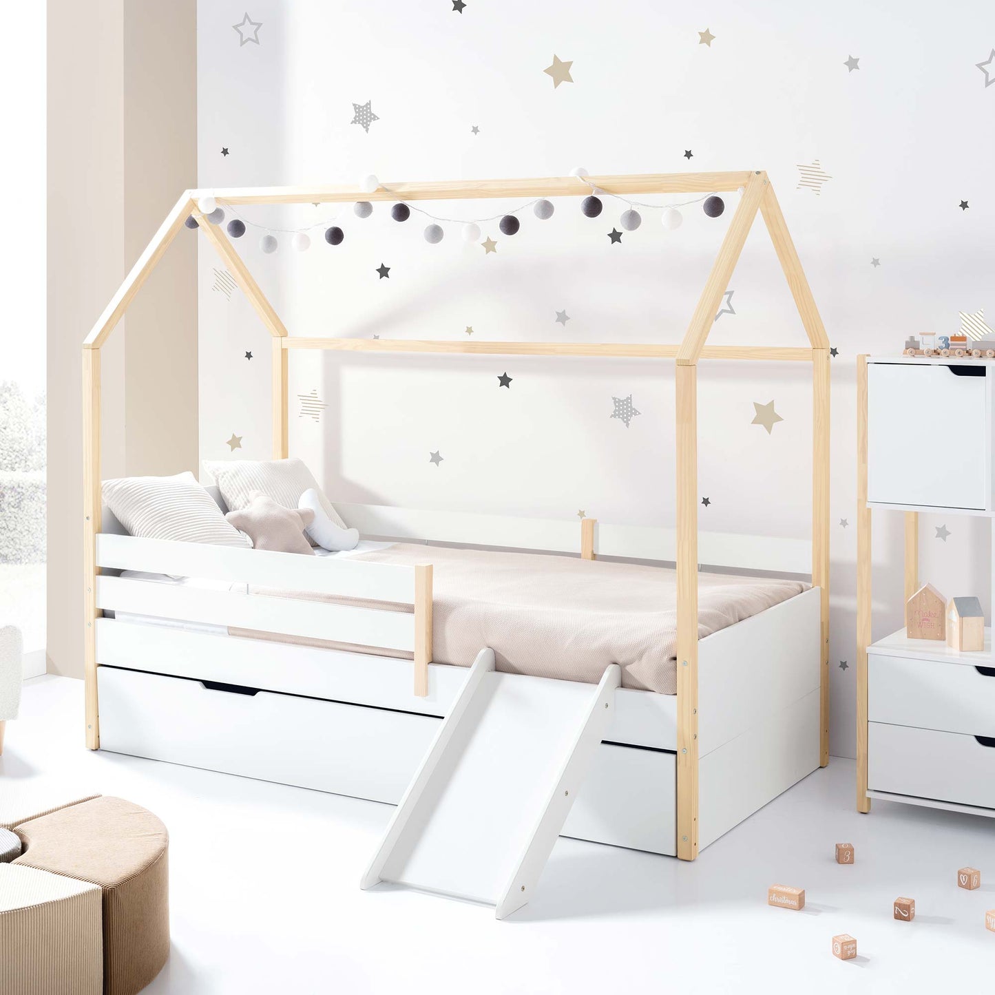 Imperial Homes House Teepee Bed with wooden frame slide and storage drawers in a bright kids room