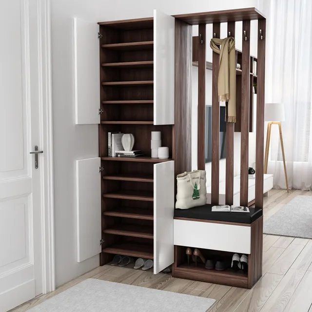 Minimalist entryway shoe storage with wooden shelves white doors and a cushioned bench by Imperial Homes