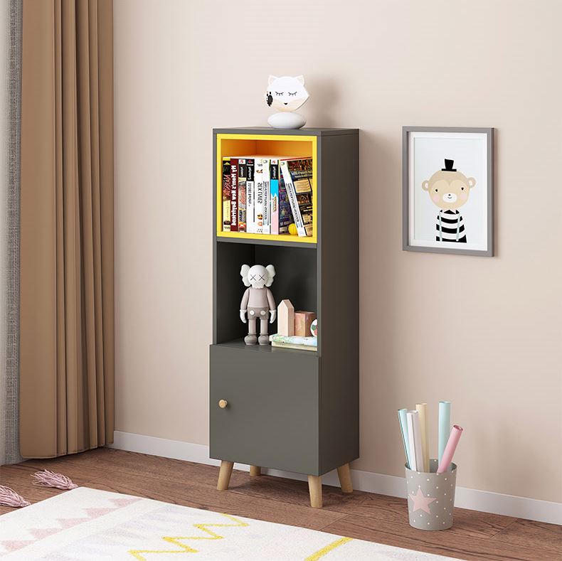 Modern bookshelf with cabinets in black and yellow by Imperial Homes with decor and books