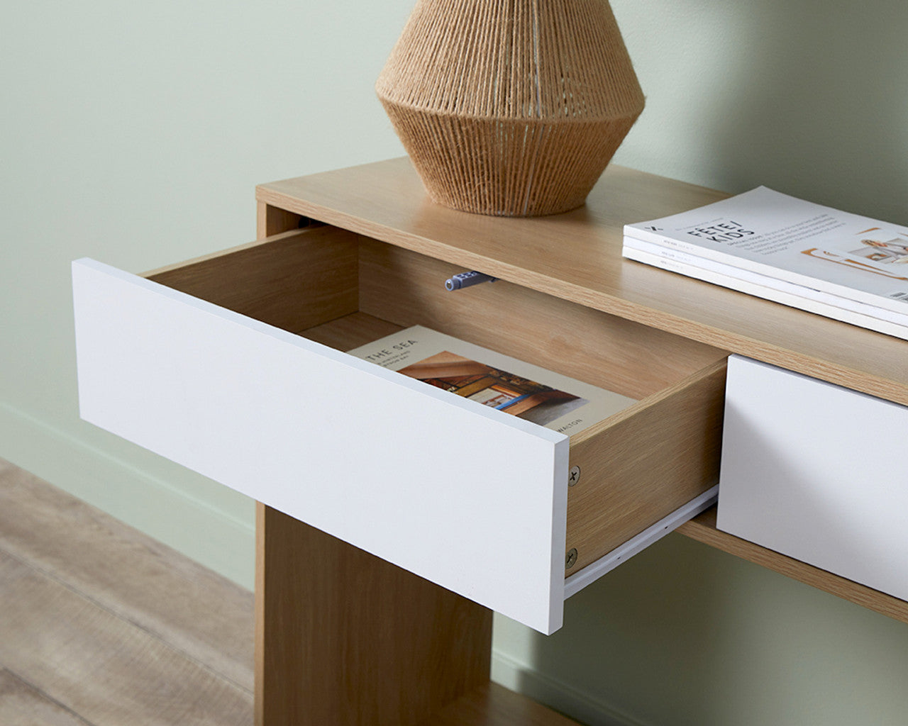 Imperial Homes coastal console table with open drawer showing storage space and modern design