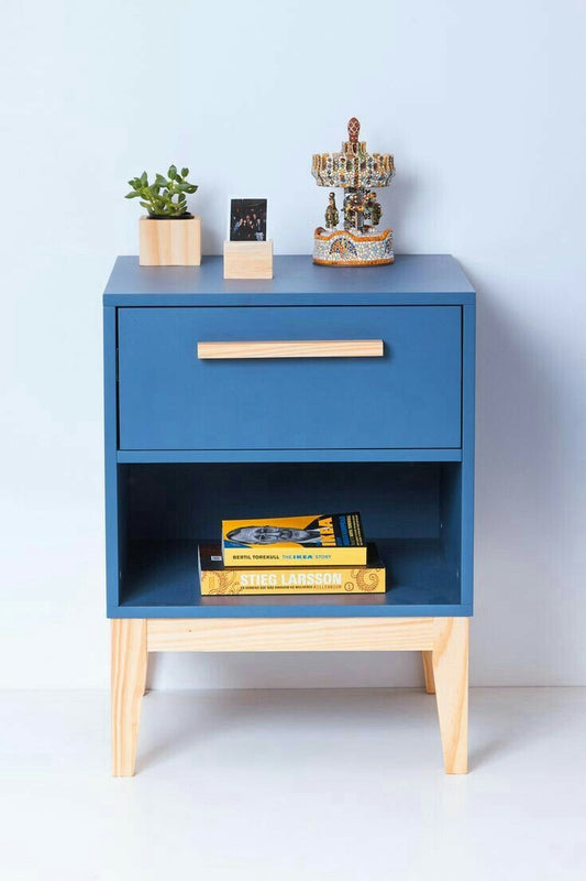 Imperial Homes blue wood side table for bedroom with drawer, open shelf, and decorative items on top