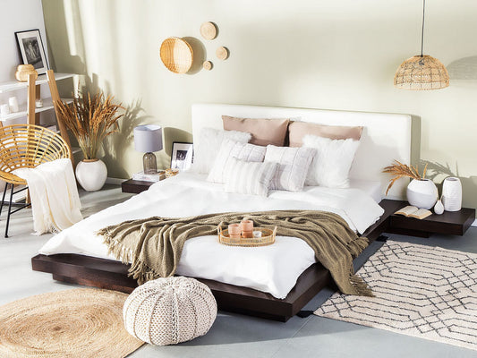 Imperial Homes minimalist platform bed in dark wood with white upholstered headboard and cozy bedding