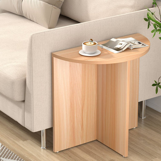 Imperial Homes wooden semi-circle side table placed beside beige sofa with coffee cup and magazines